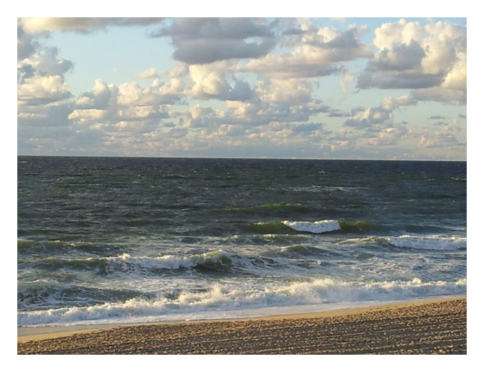 Wolken am  Meer und Strand